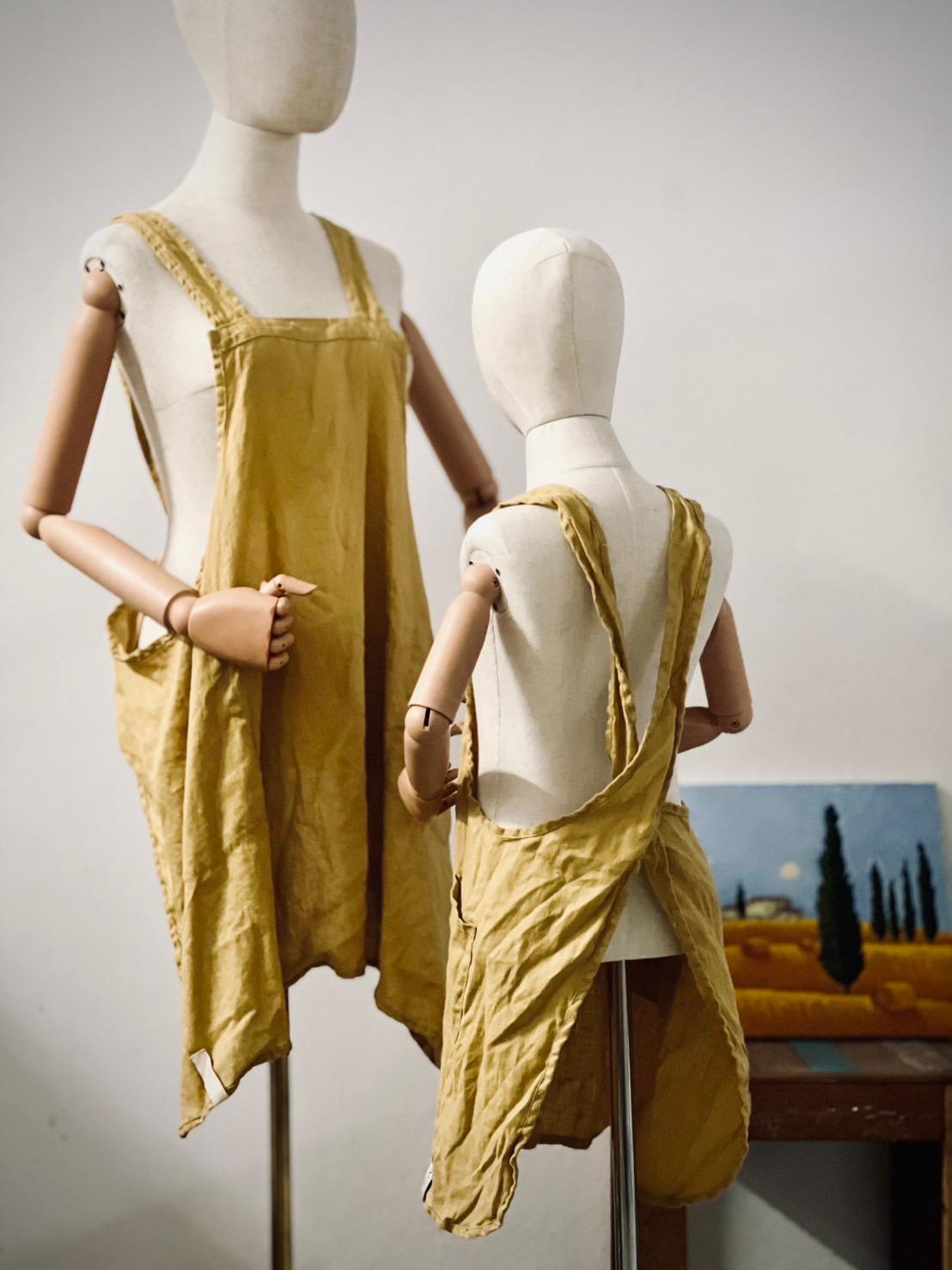 Artisan linen cross-back apron in mustard, adult and child set